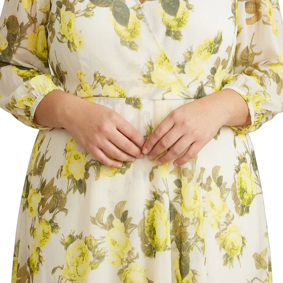 Calvin Klein floral dress with yellow flowers on a white background