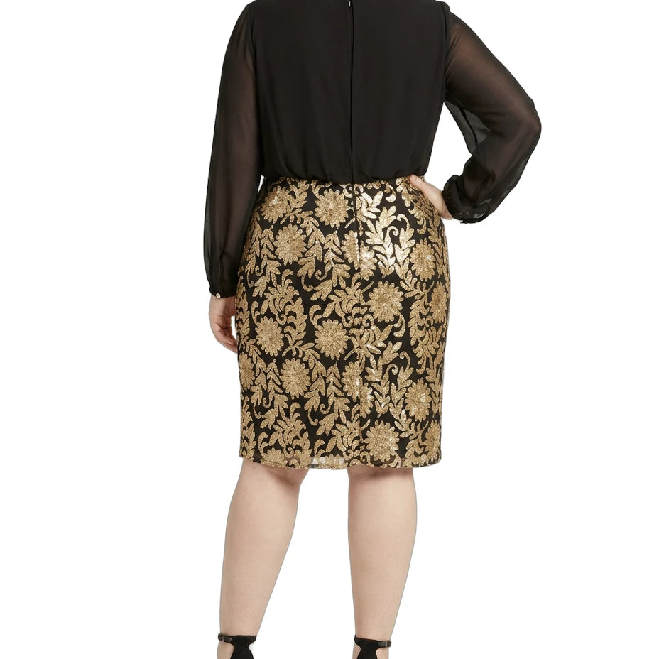 Woman wearing a Calvin Klein black and gold floral dress on a white background