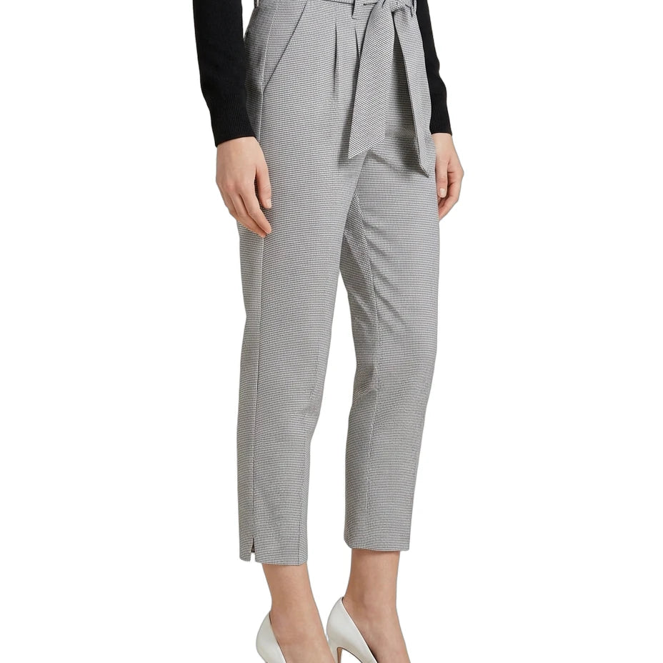 Gray Calin Klein pants with a tie waist worn by a person on a white background