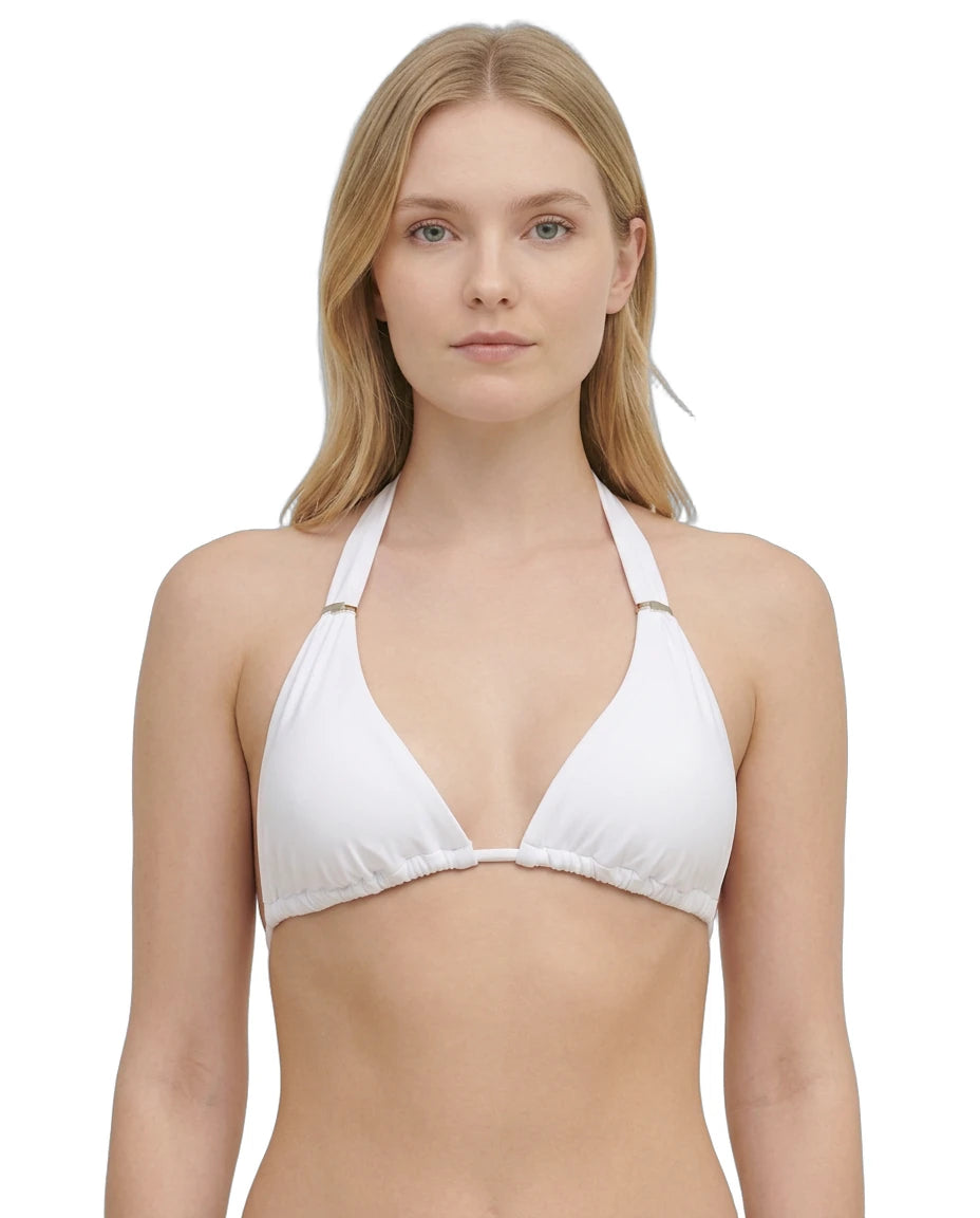 Woman wearing a white bikini Calvin Klein top on a white background