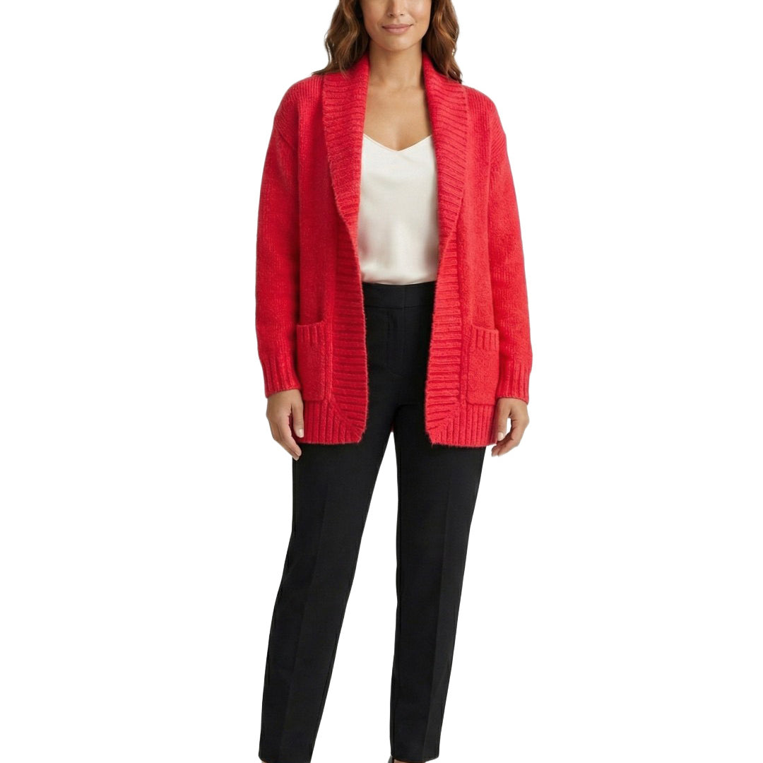 Woman wearing a red cardigan over a white top and black pants on a white background
