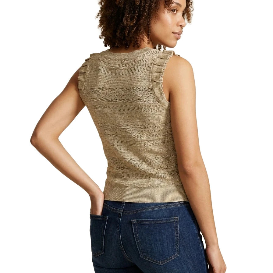 Back view of a woman wearing the INC International Concepts beige sleeveless knit sweater showing the back neckline, textured weave, and shoulder ruffles.