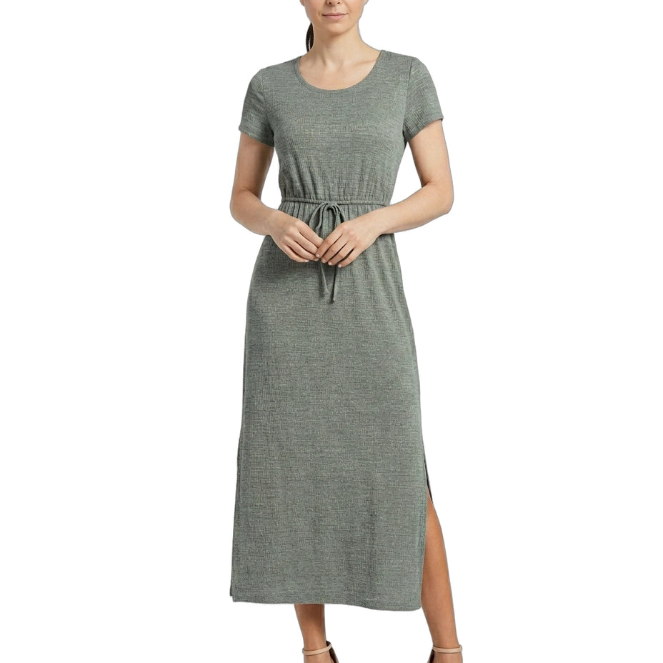 Woman wearing a gray dress with a white background