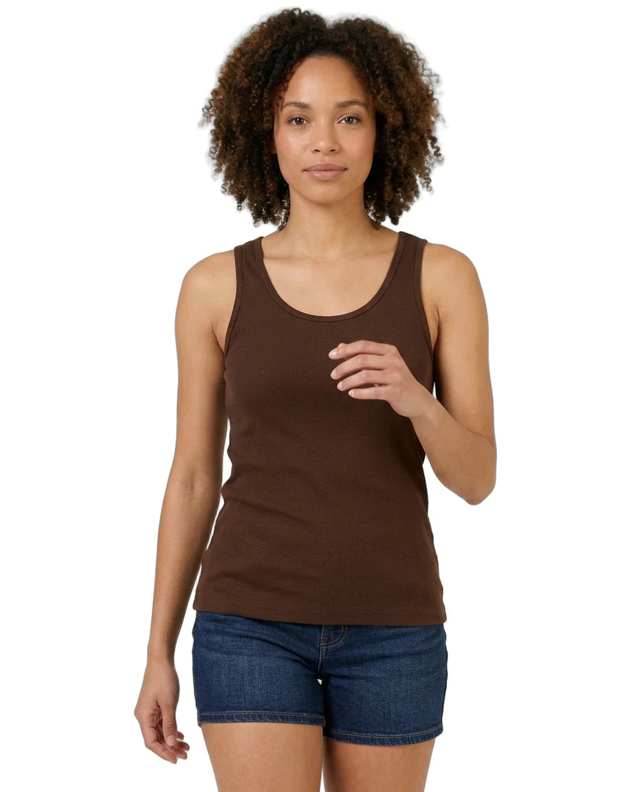 Woman wearing a brown tank top and blue shorts on a white background