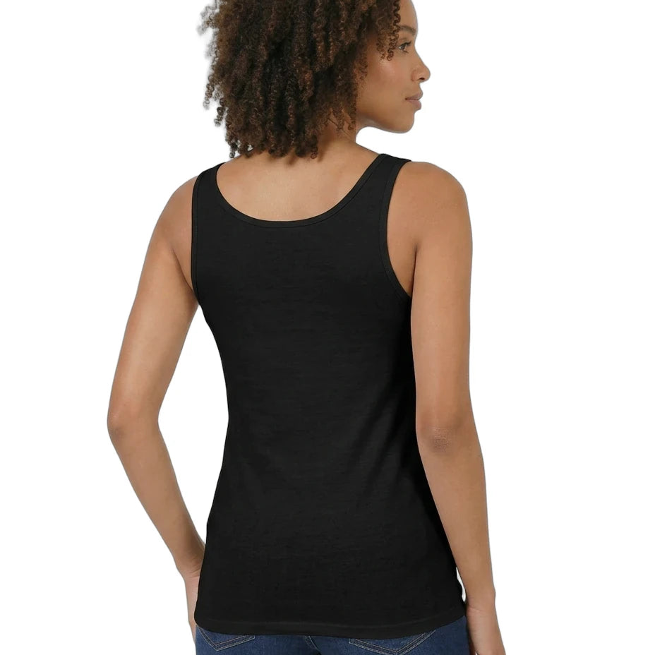 Woman wearing a black tank top and blue shorts on a white background