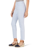 Light blue jeans worn by a person on a white background