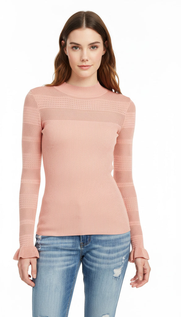 Woman wearing a pink sweater and blue jeans on a white background