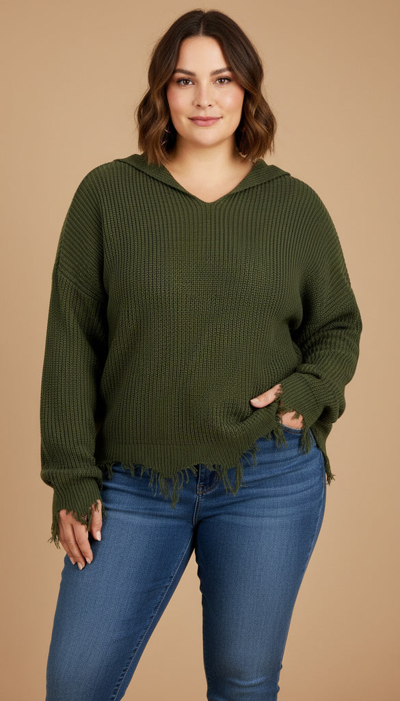 Woman wearing an olive green hoodie and blue jeans on a beige background