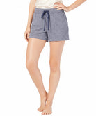 Person wearing blue striped shorts on a white background