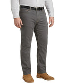 A man wearing gray slim-fit jeans with a black belt, a white striped long-sleeve shirt, and brown suede shoes, shown from the waist down on a white background.