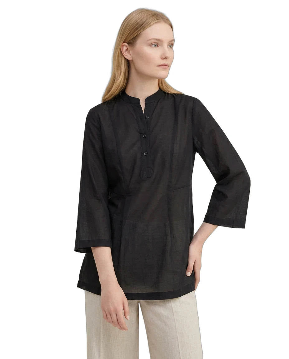 Woman wearing a black long-sleeve shirt on a white background