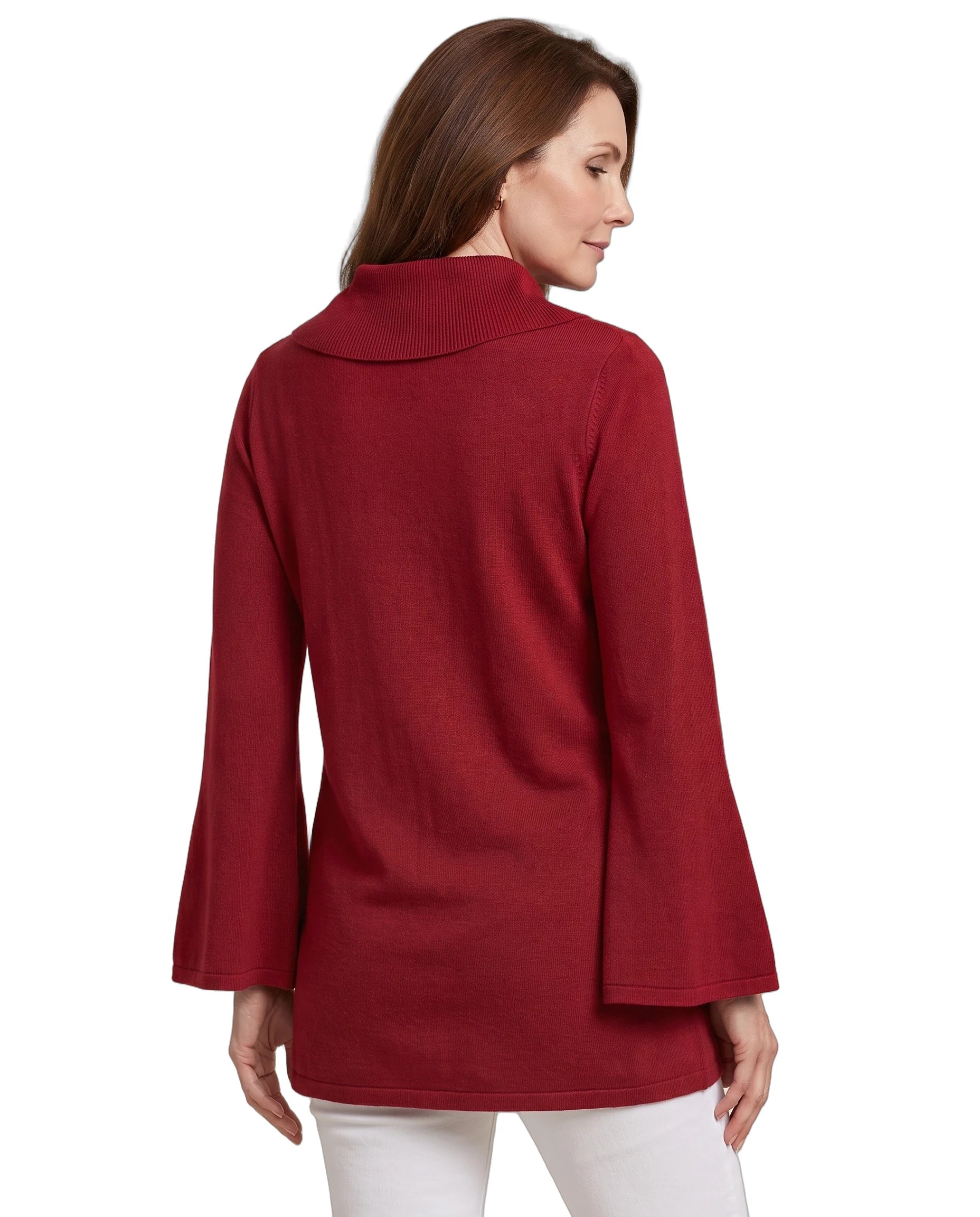 A woman shown from the back wearing a long-sleeve knit turtleneck sweater in deep burgundy red, paired with white pants, against a plain white background.