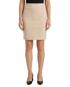 A model wearing a beige high-waisted knee-length pencil skirt with a black top and black patent leather heels, shown against a plain white background.