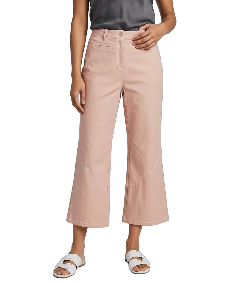 A model wearing dusty pink cropped wide-leg pants, paired with a dark gray top and white slide sandals, shown against a plain white background.