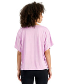 Person wearing a light purple t-shirt on a white background