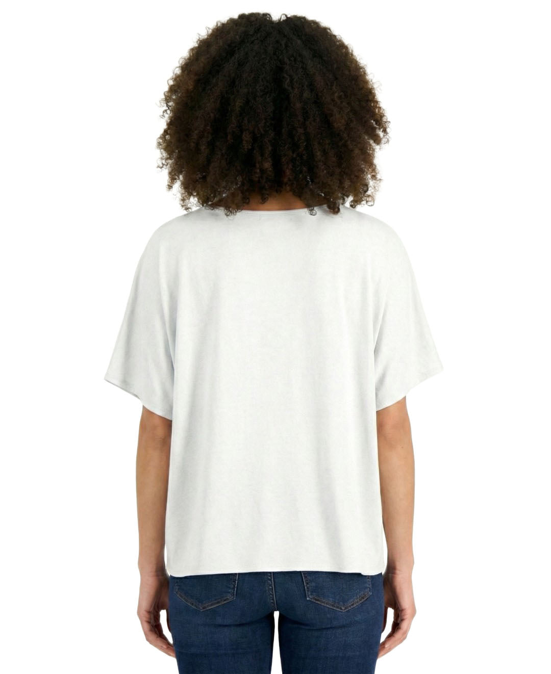 Person wearing a white t-shirt and blue jeans on a white background