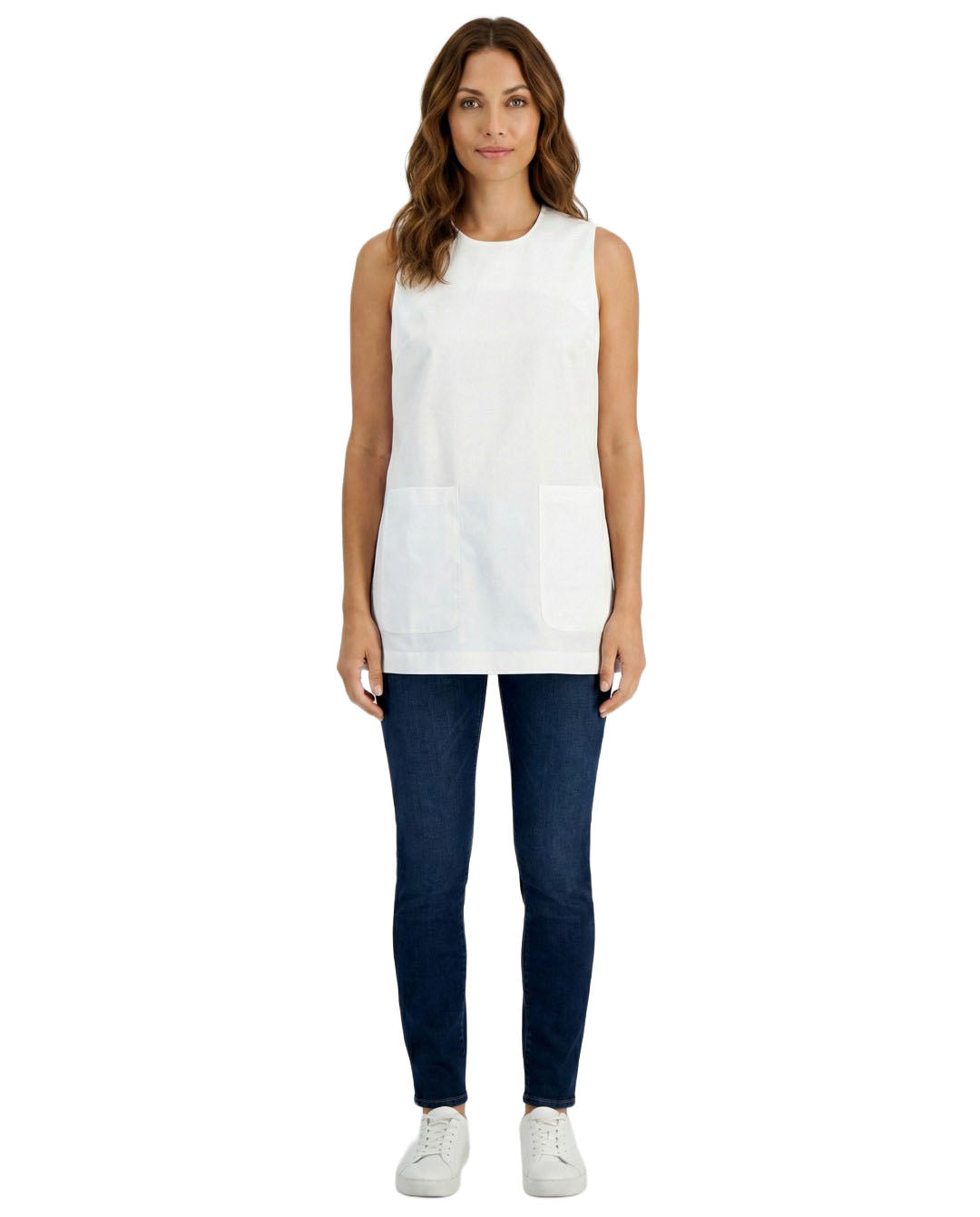 Woman wearing a white sleeveless top and dark blue pants on a white background