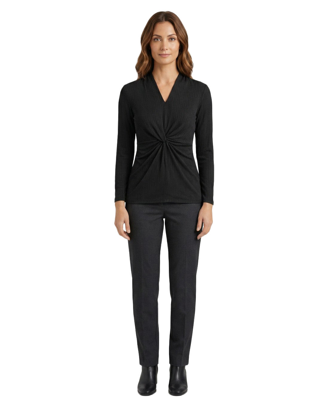 Woman wearing a black long-sleeve top and pants on a white background
