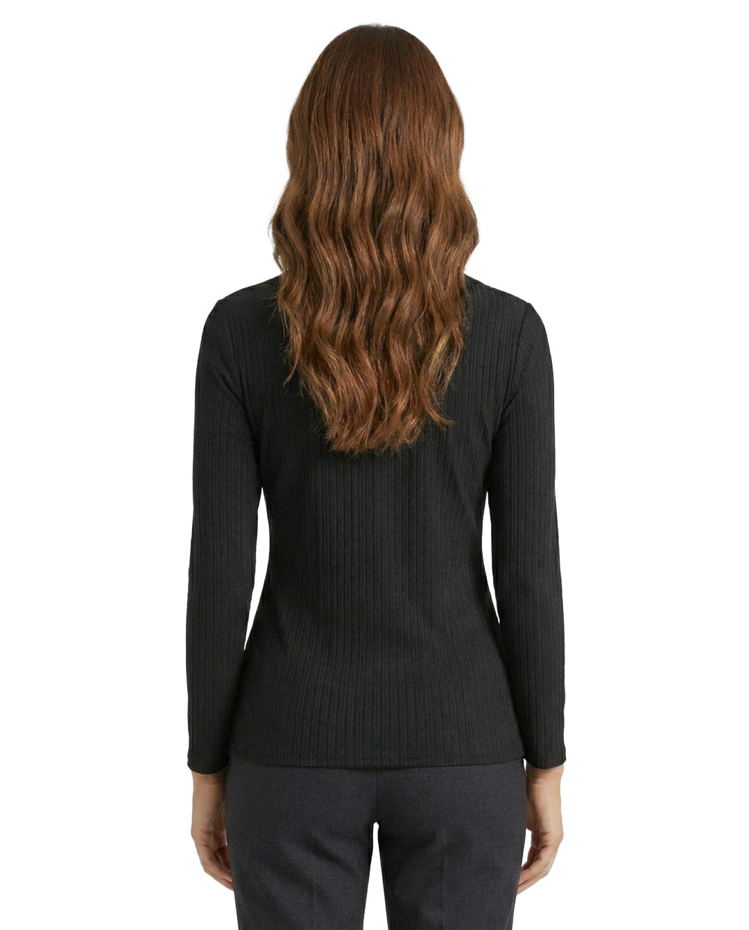Person wearing a black ribbed long-sleeve top on a white background