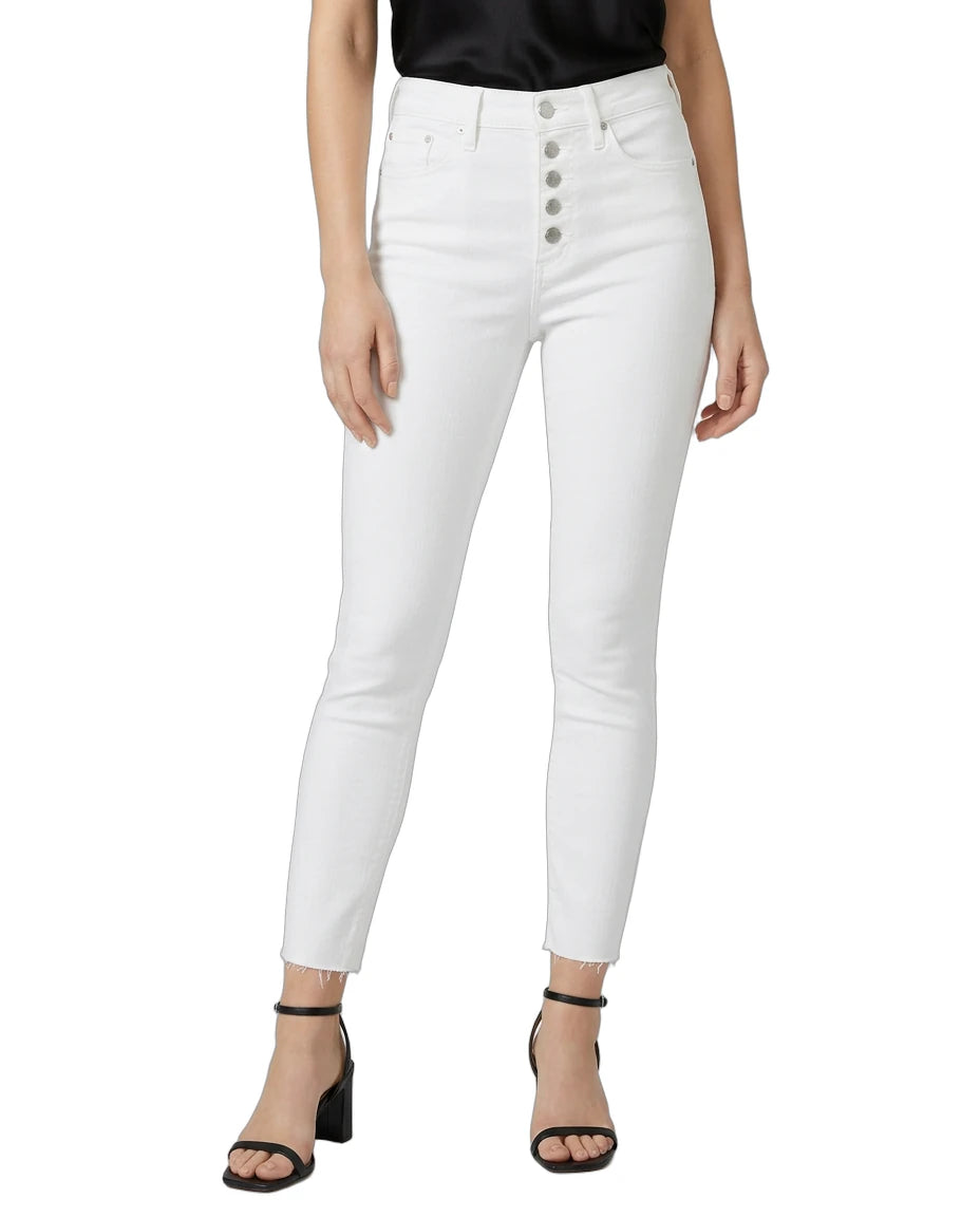 White jeans worn by a person on a white background
