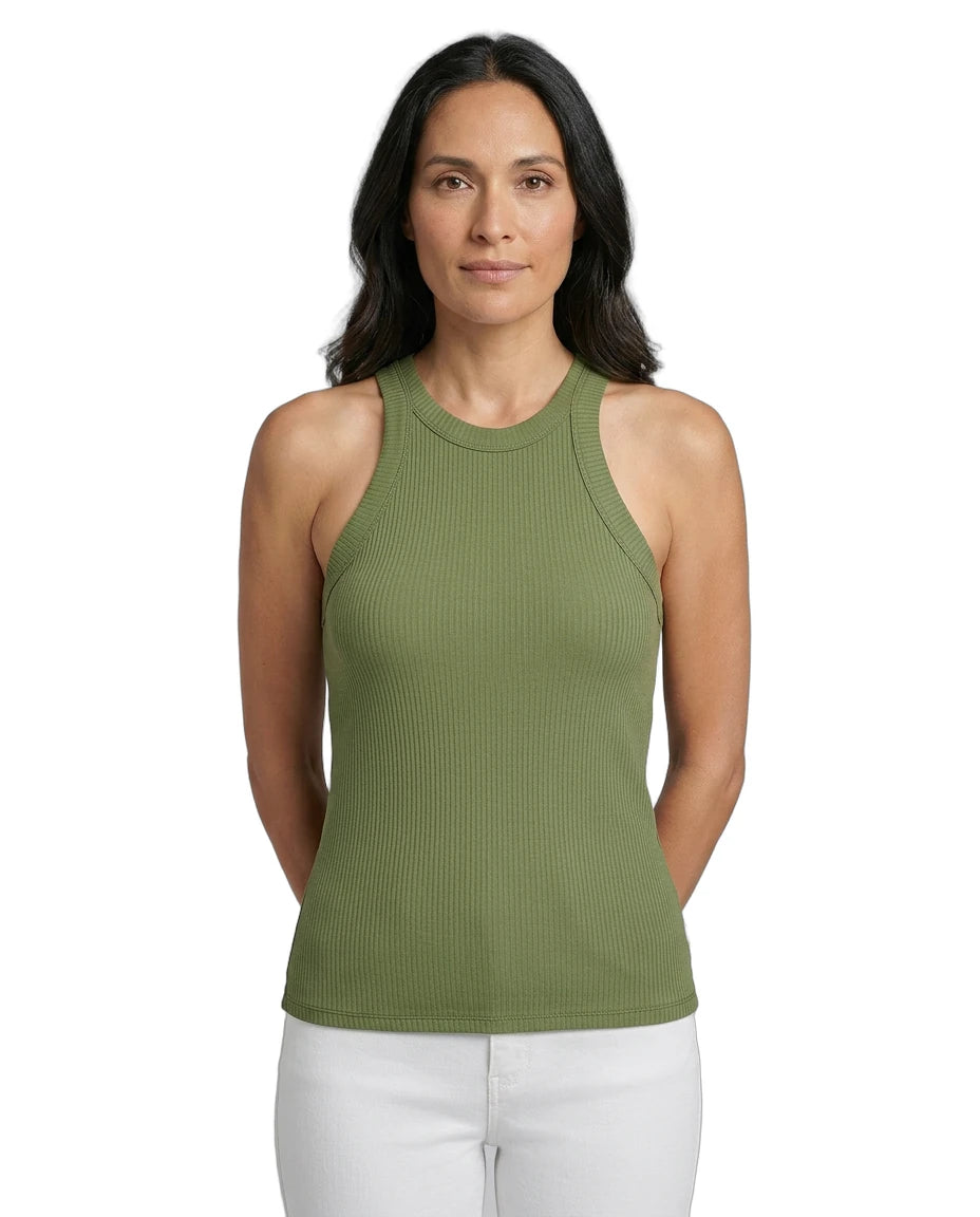 Woman wearing a green sleeveless top on a white background