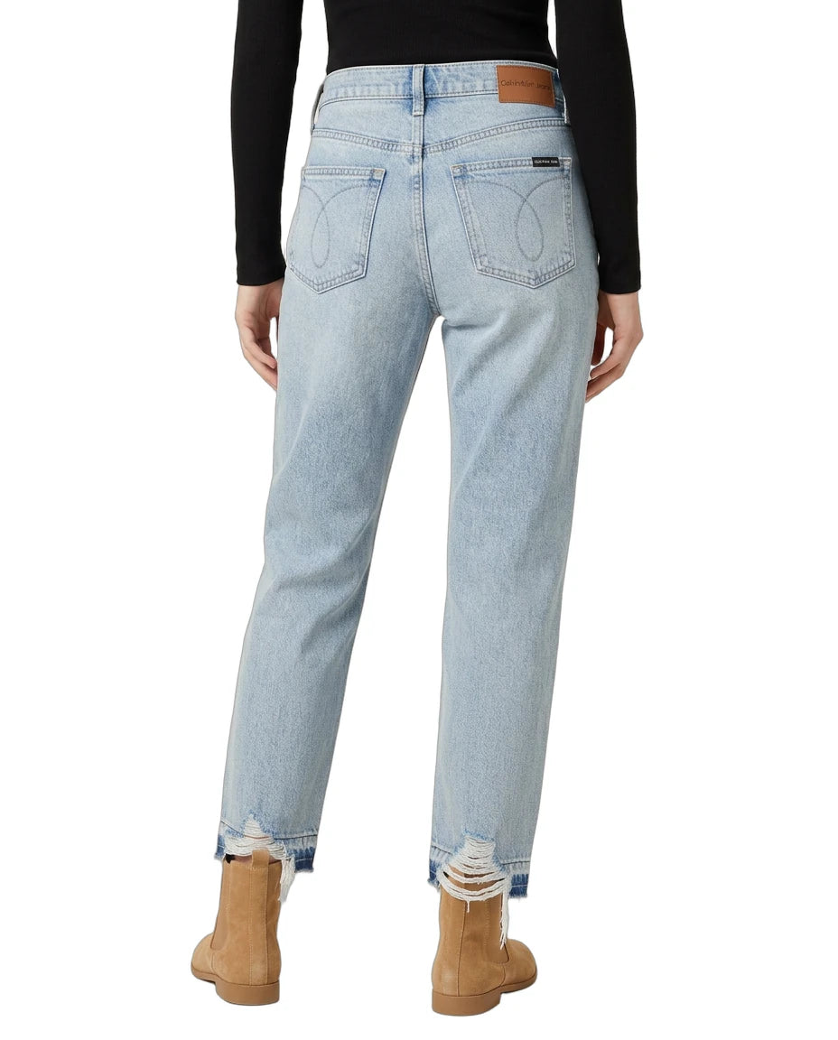 Light blue jeans worn by a person on a white background