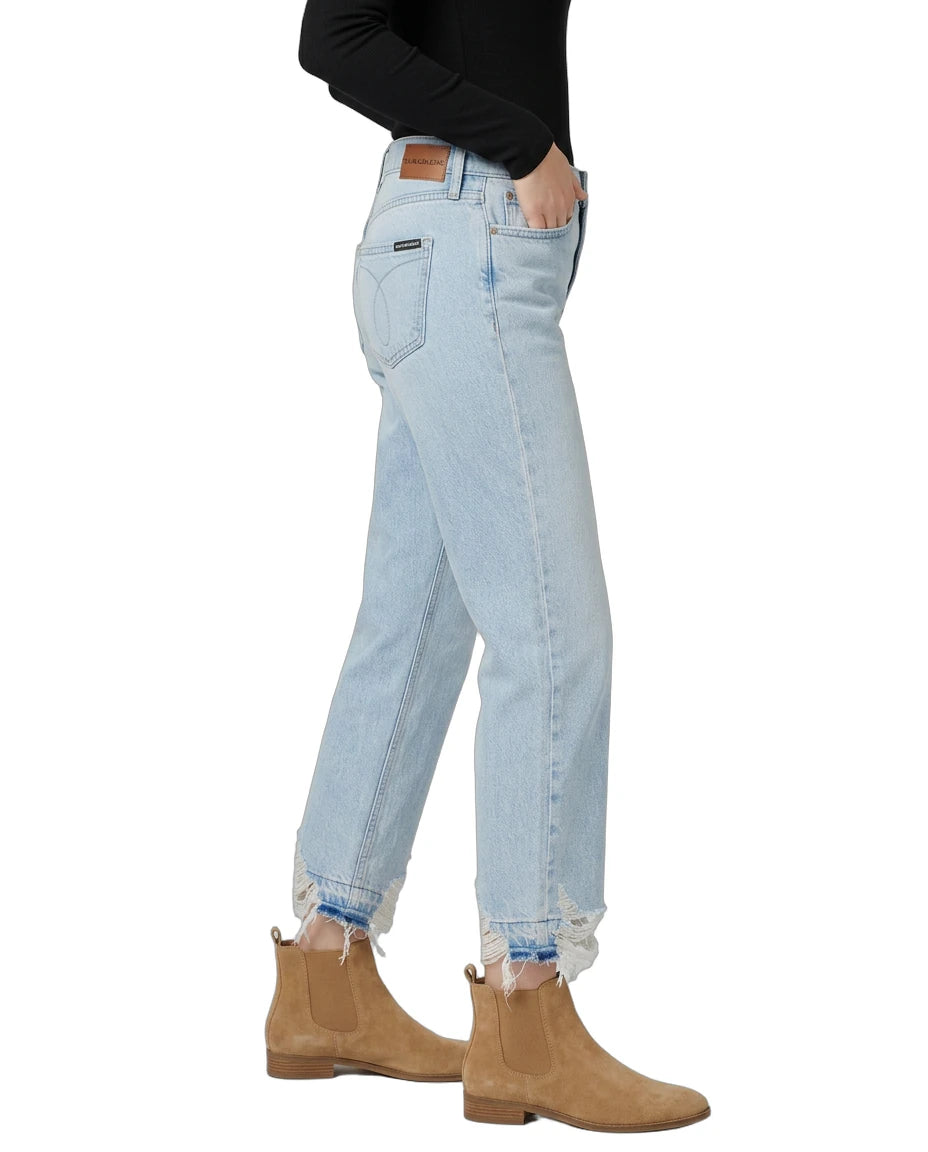 Light blue jeans worn by a person on a white background