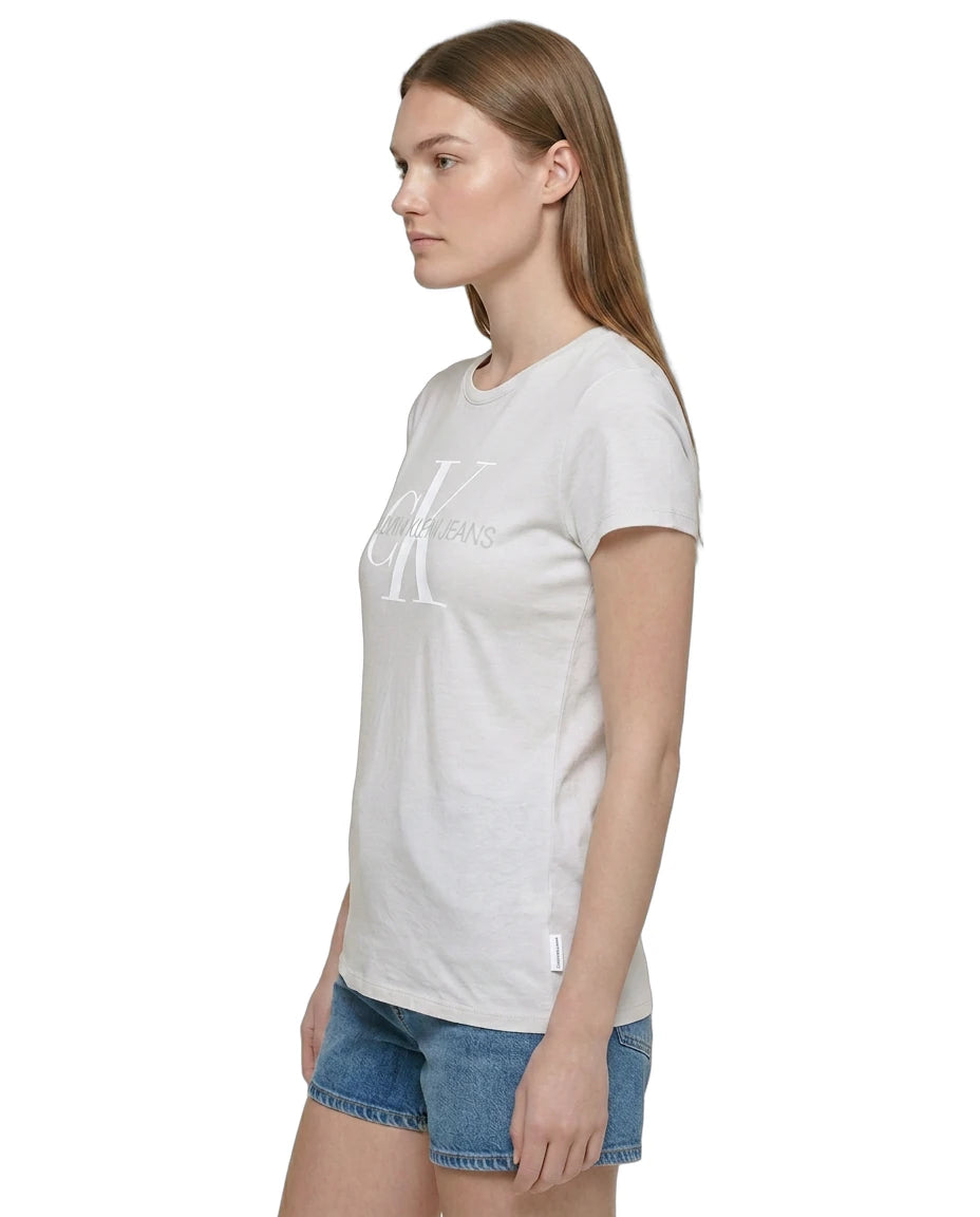 Woman wearing a white t-shirt with a logo on a white background