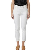 Person wearing white jeans on a white background