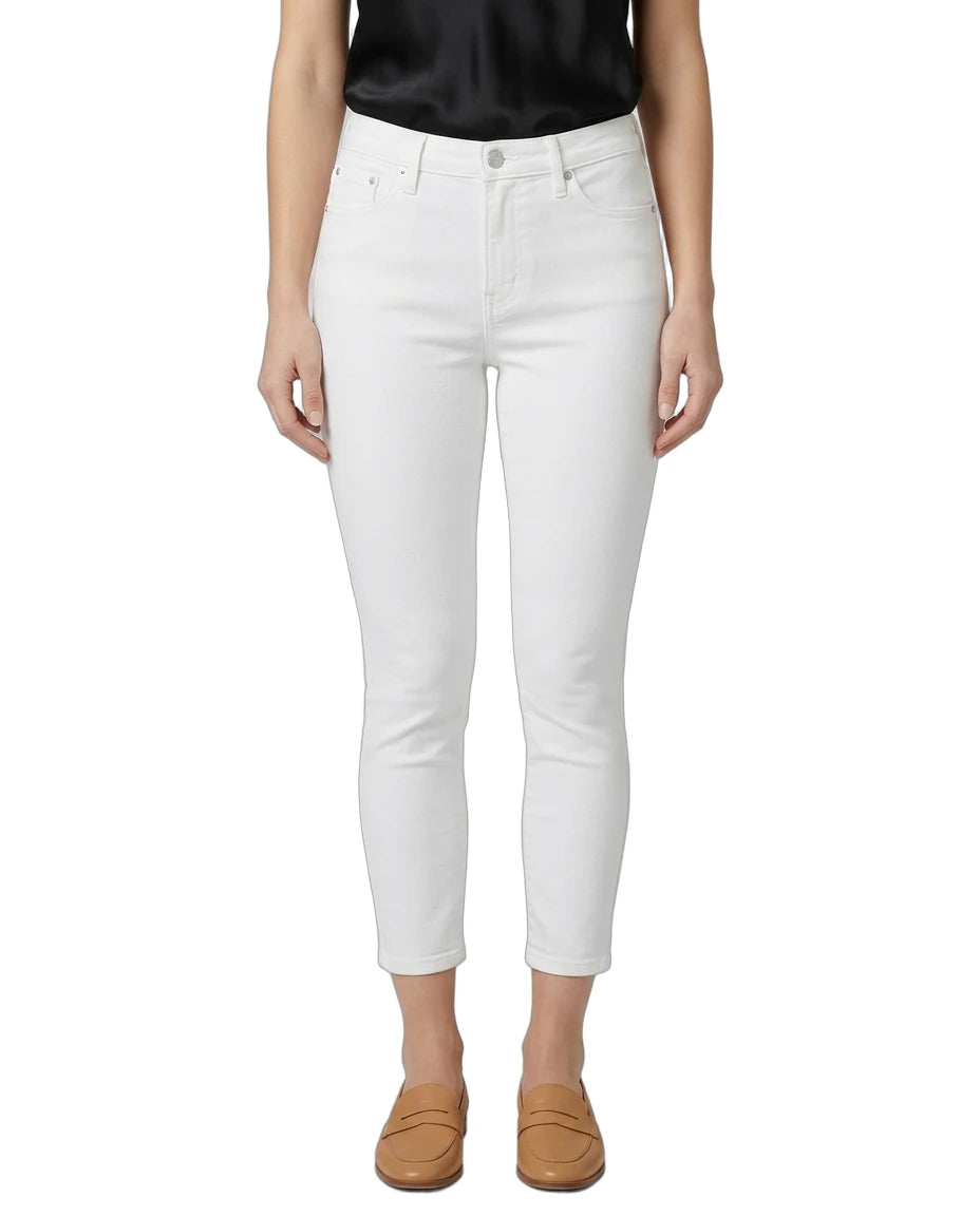 Person wearing white jeans on a white background