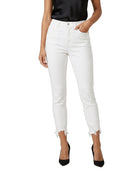 Person wearing white jeans on a white background