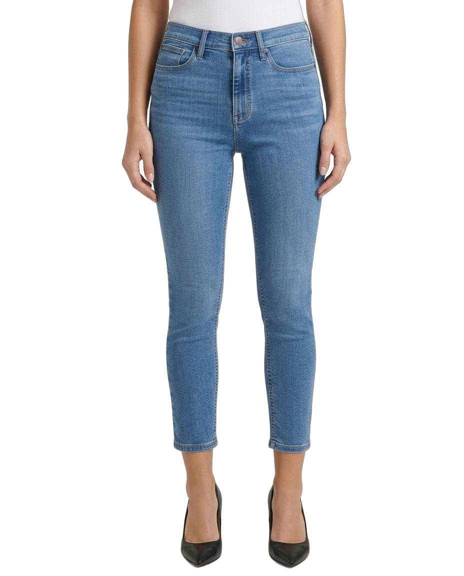 Blue jeans worn by a person on a white background
