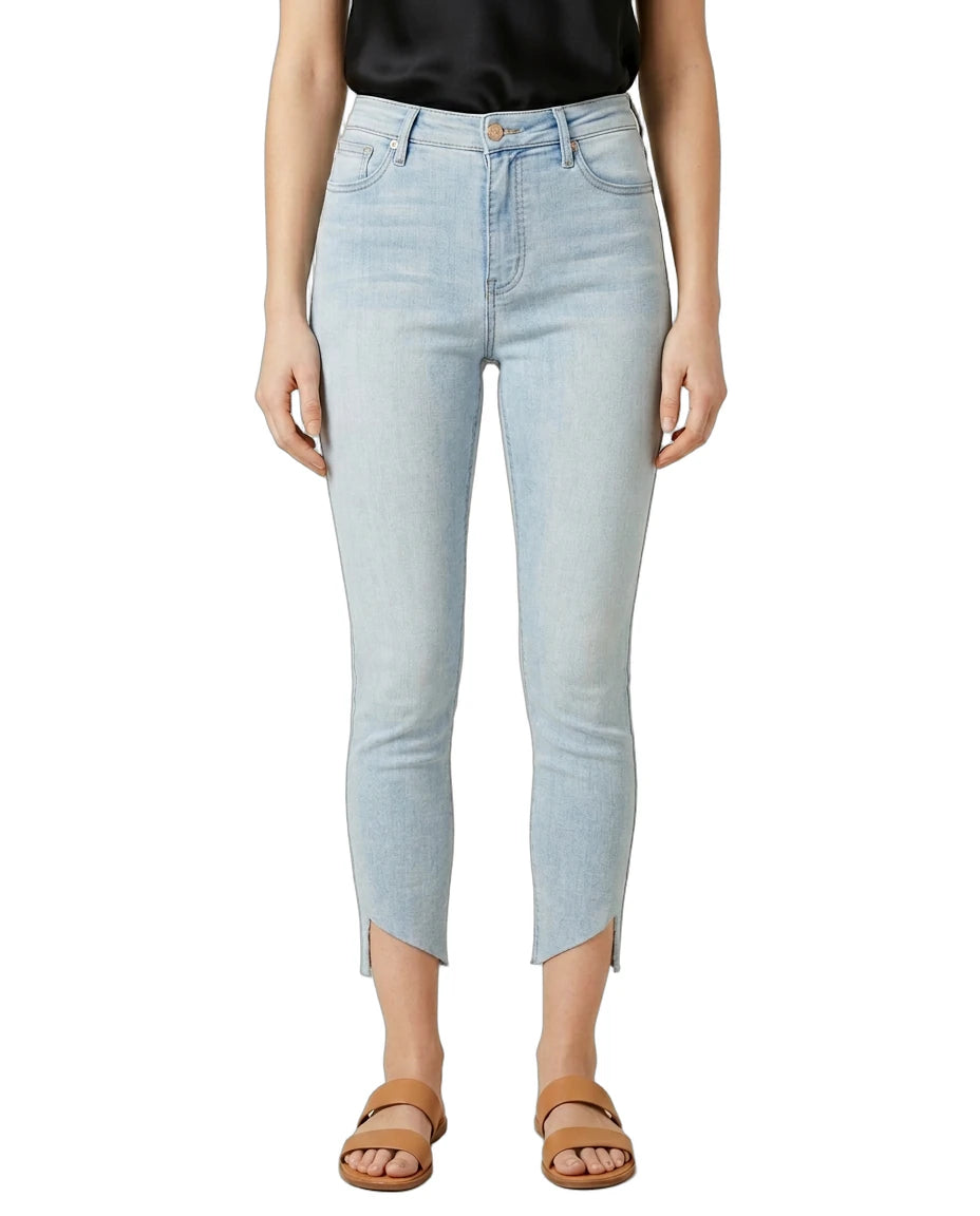 Light blue jeans worn by a person on a white background