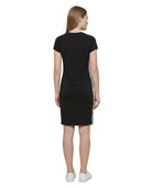 Black Calvin Klein dress with white stripes on the sleeves worn by a model on a white background