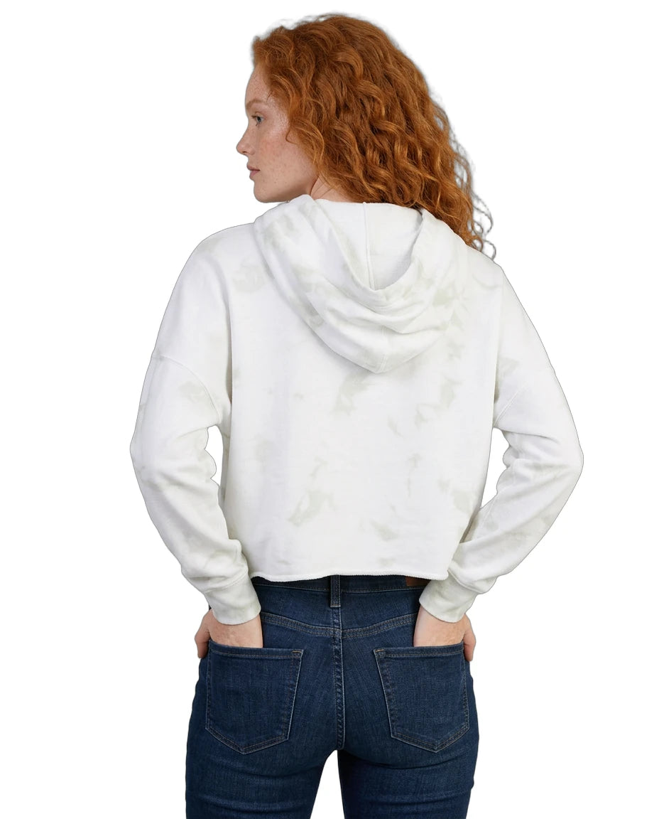 Person wearing a white Calvin Klein hoodie and blue jeans on a white background