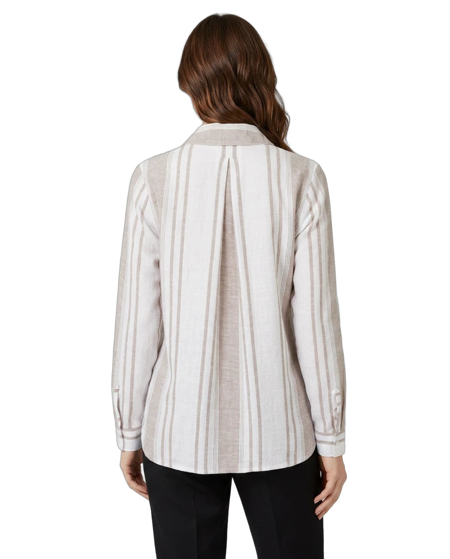 Woman wearing a striped Calvin Klein shirt on a white background