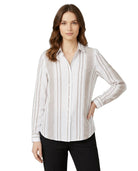 Woman wearing a white and gray striped Calvin Klein shirt on a white background