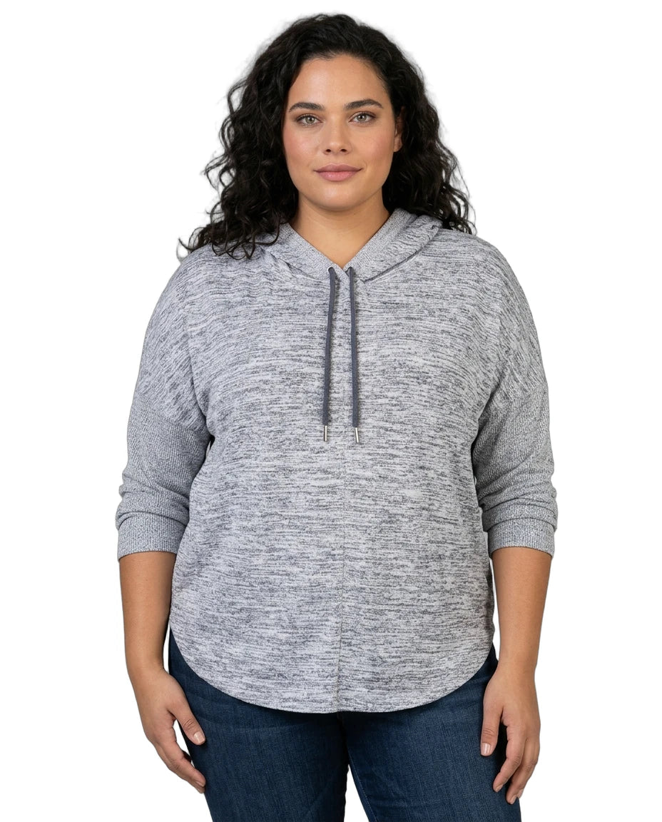 Woman wearing a gray hoodie on a white background