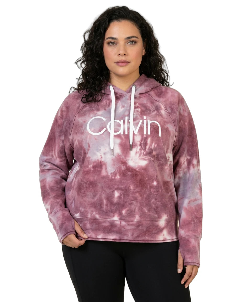 Person wearing a pink tie-dye hoodie with 'Calvin' logo on a white background