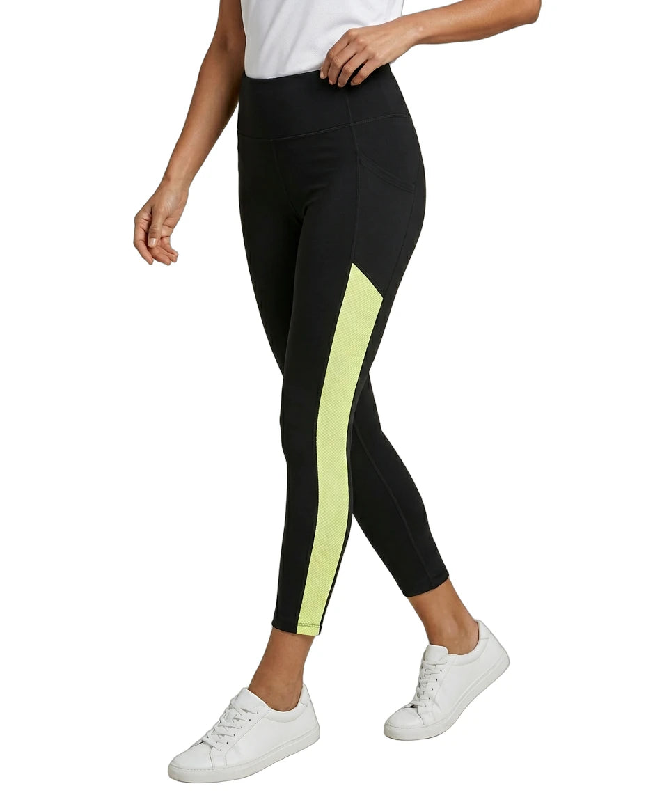 Black Calvin Klein leggings with a yellow stripe worn by a person on a white background