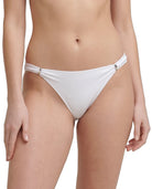 woman wearing Calvin Klein bikini bottoms on a white background