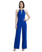 Woman wearing a blue jumpsuit on a white background