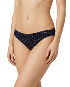 Navy blue polka dot underwear with Calvin Klein branding on a white background