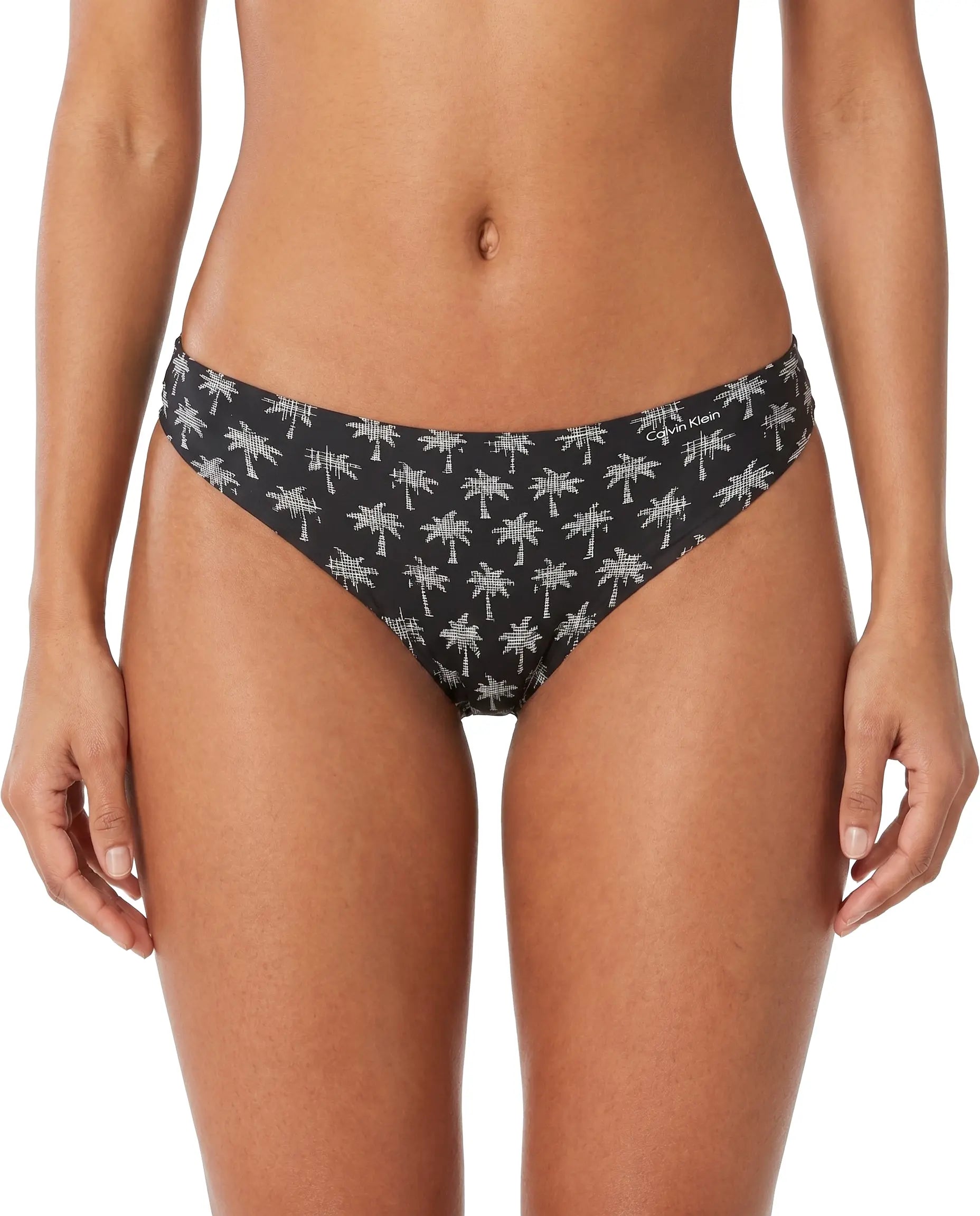 Black bikini bottom with palm tree pattern on a white background