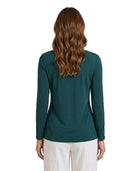 Woman wearing a teal Calvin Klein long-sleeve top on a white background