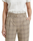 Calvin Klein Beige plaid pants worn by a person on a white background