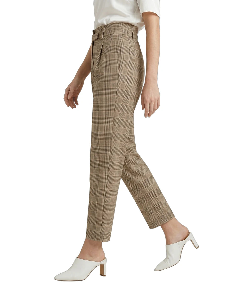 Calvin Klein Plaid pants worn by a person on a white background
