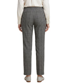Gray Calvin Klein checkered pants worn by a person on a white background