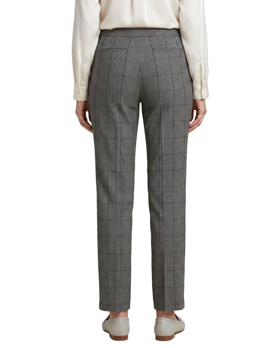 Gray Calvin Klein checkered pants worn by a person on a white background