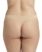 Beige underwear worn by a person on a white background